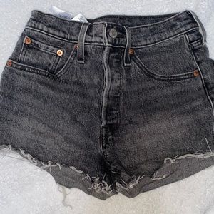 Levis 501 raw hem washed black high rise button jean shorts